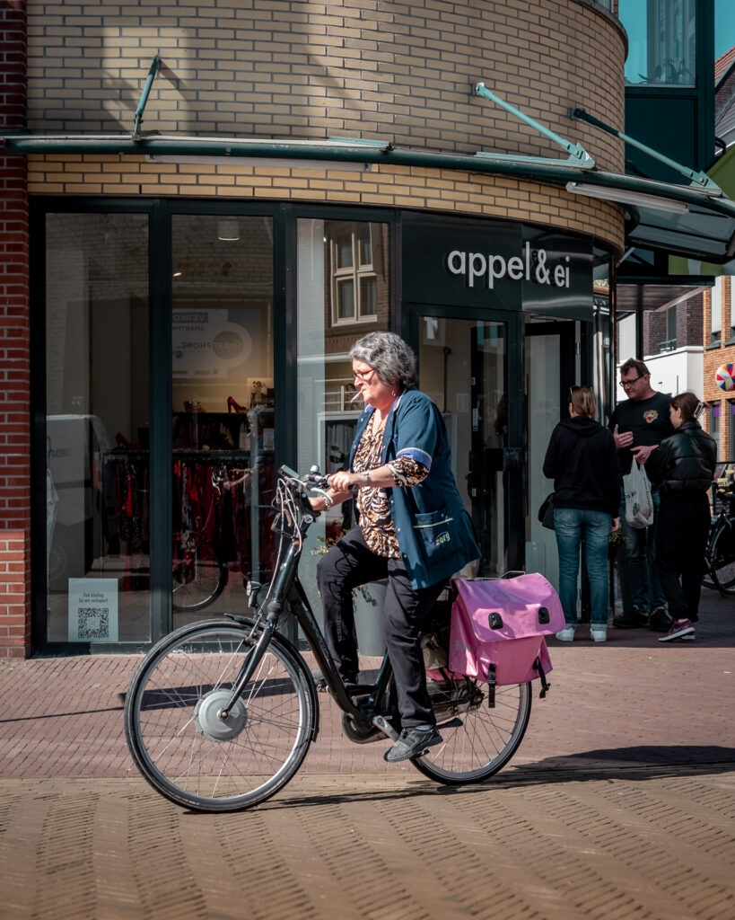 Smoking woman on bicycle3